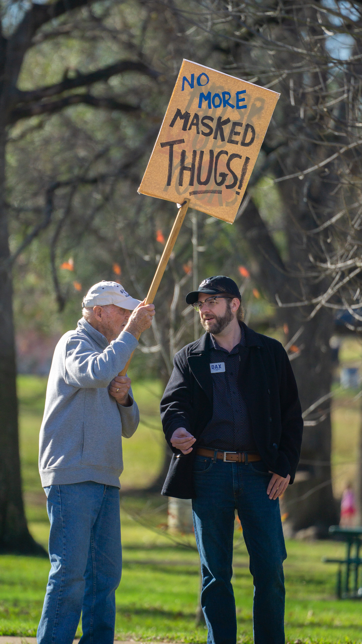 Candidate engaging with a constituent at a community event