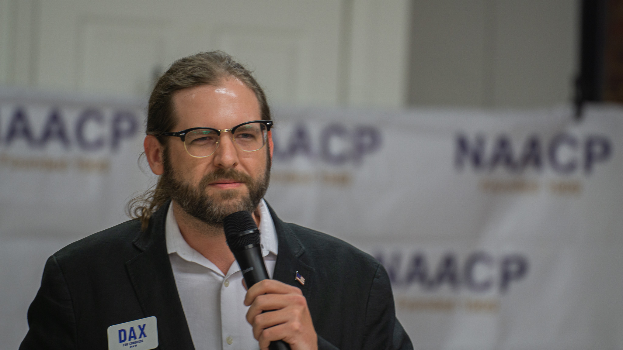 Contemplative portrait at NAACP campaign event