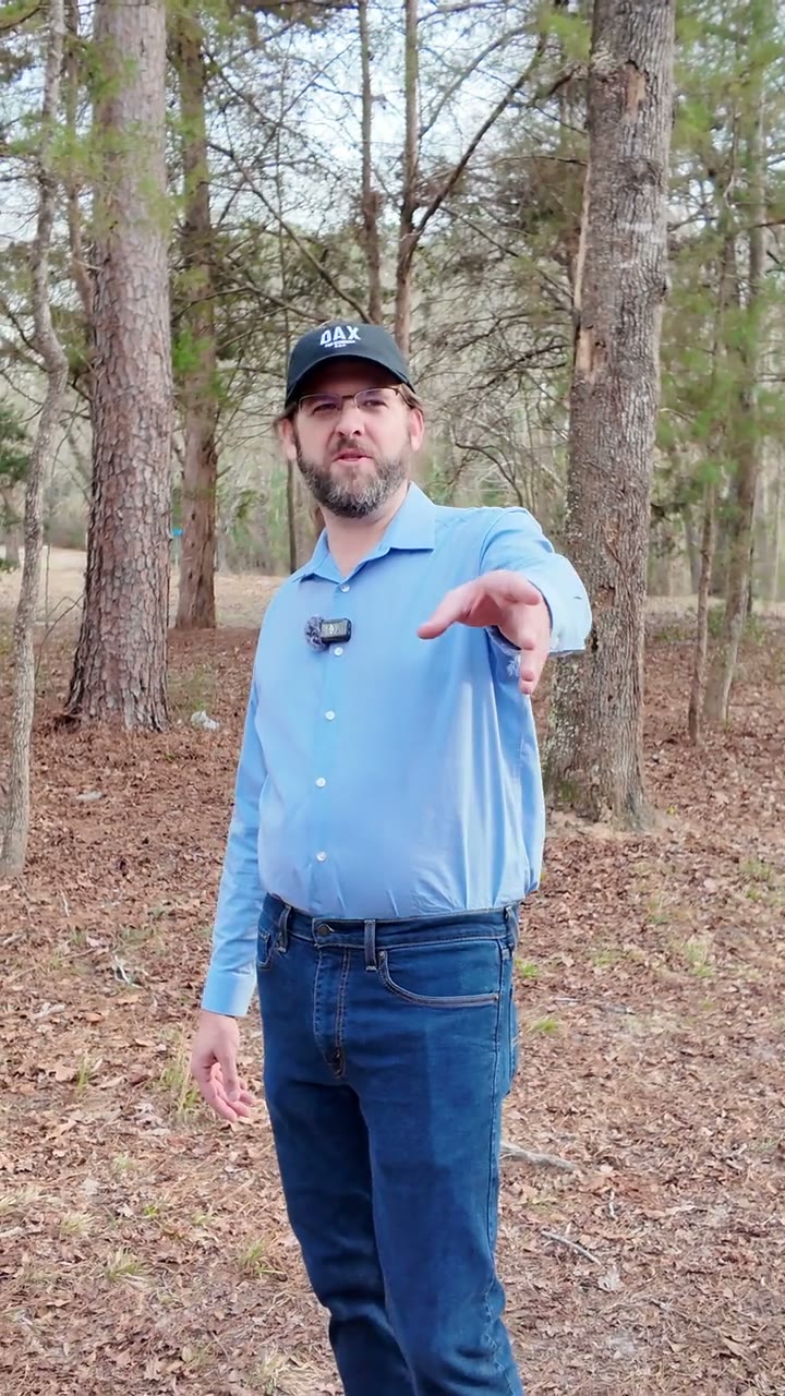 Dax Alexander speaking to camera in a wooded setting for a campaign reel